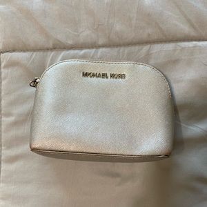 Silver Michael Kors makeup bag